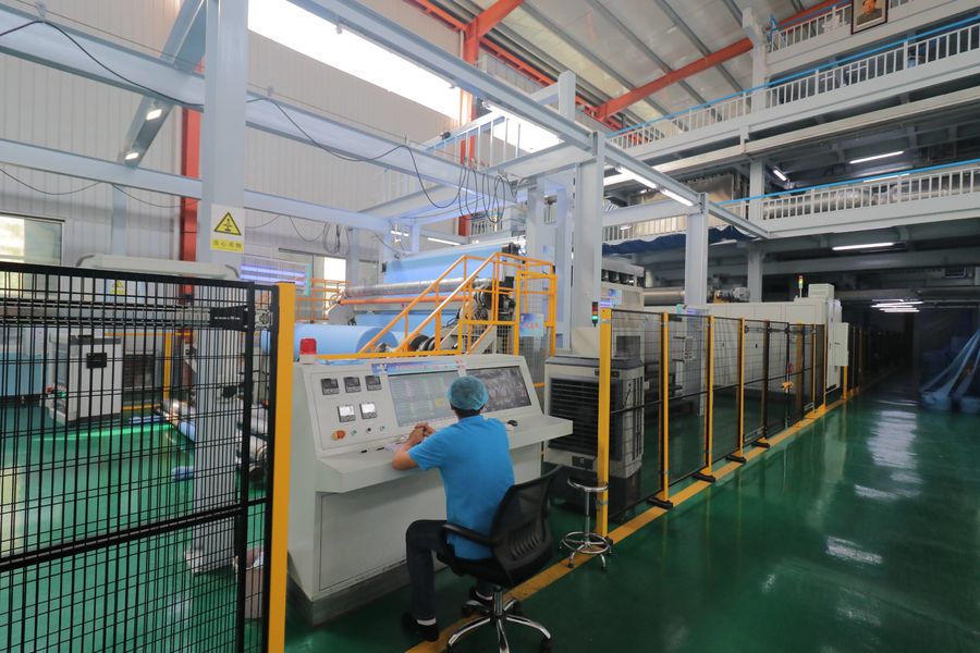 Xinyang Yihe Non-Woven Co., Ltd. خط إنتاج الشركة المصنعة